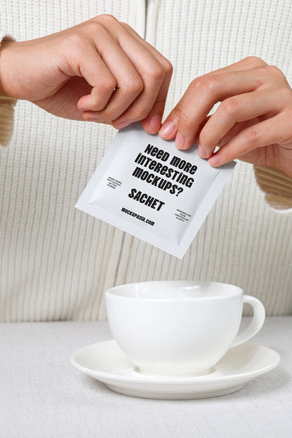sachet mockup pouring into cup with hands and realistic beverage preparation scene