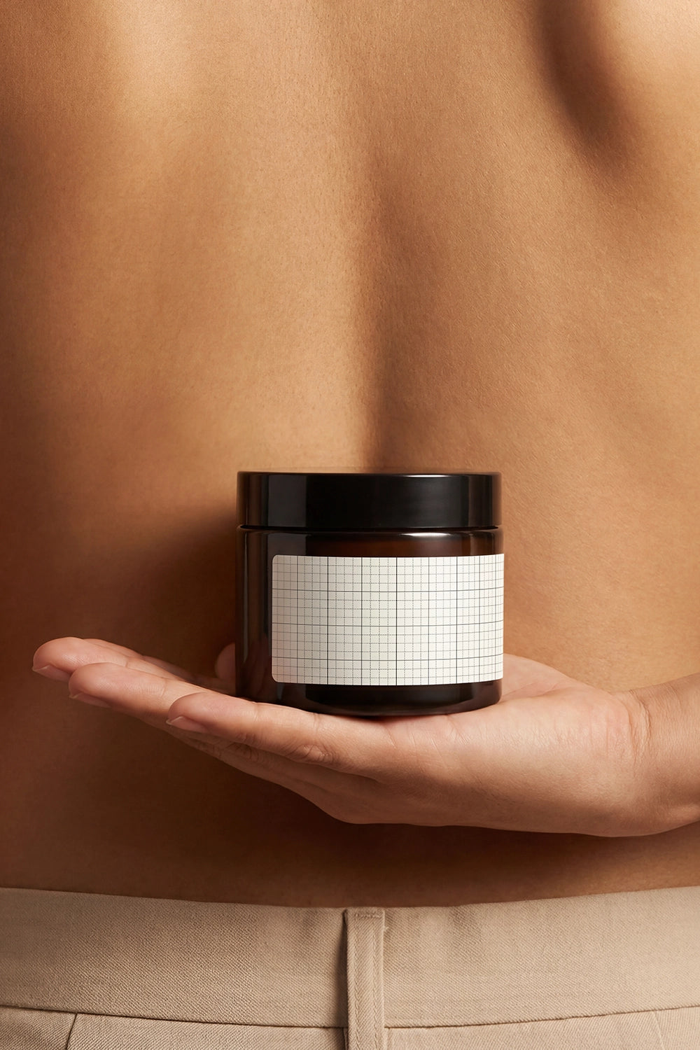 Amber cream jar PSD mockup for skincare product presentation.