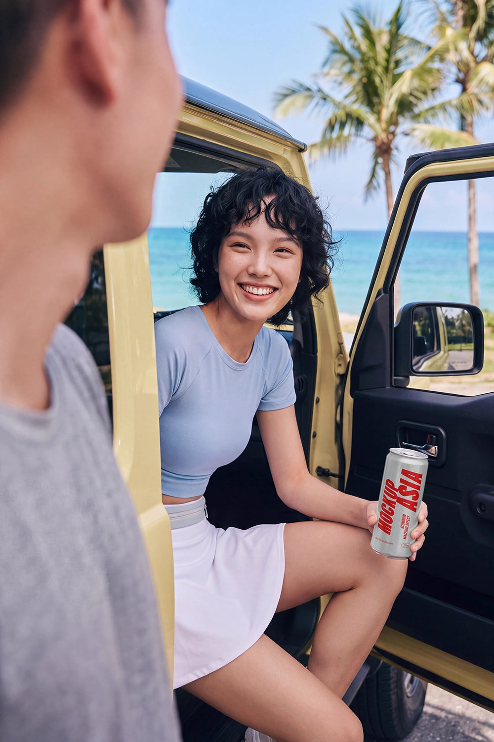 Lifestyle beverage packaging mockup with car, ocean, and palm trees