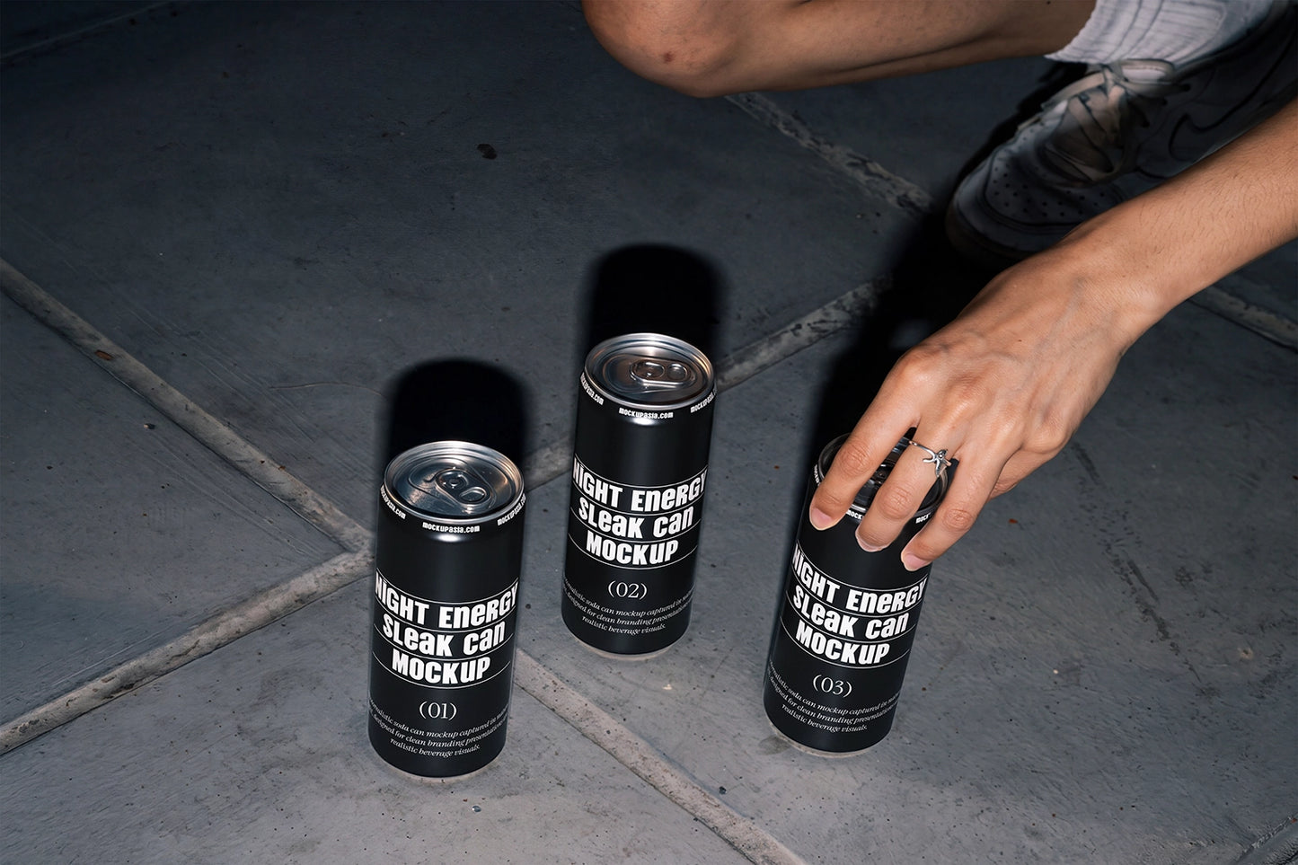 Slim beverage can mockup featuring an urban street setting and direct flash lighting.