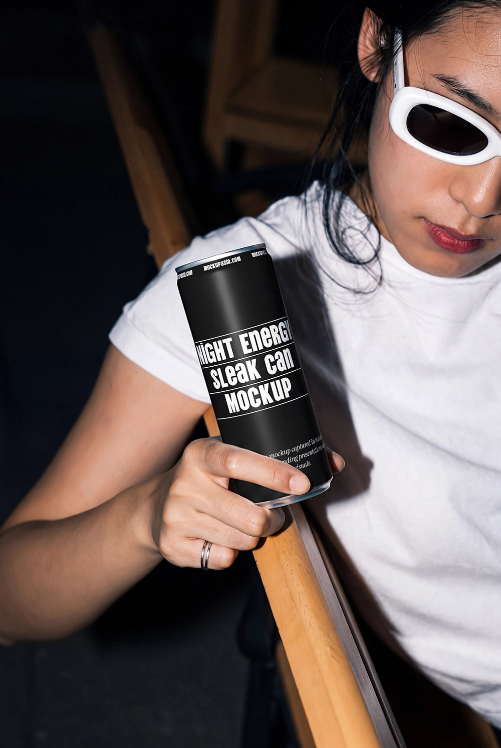 Slim beverage can mockup with editable label in a modern editorial setting.