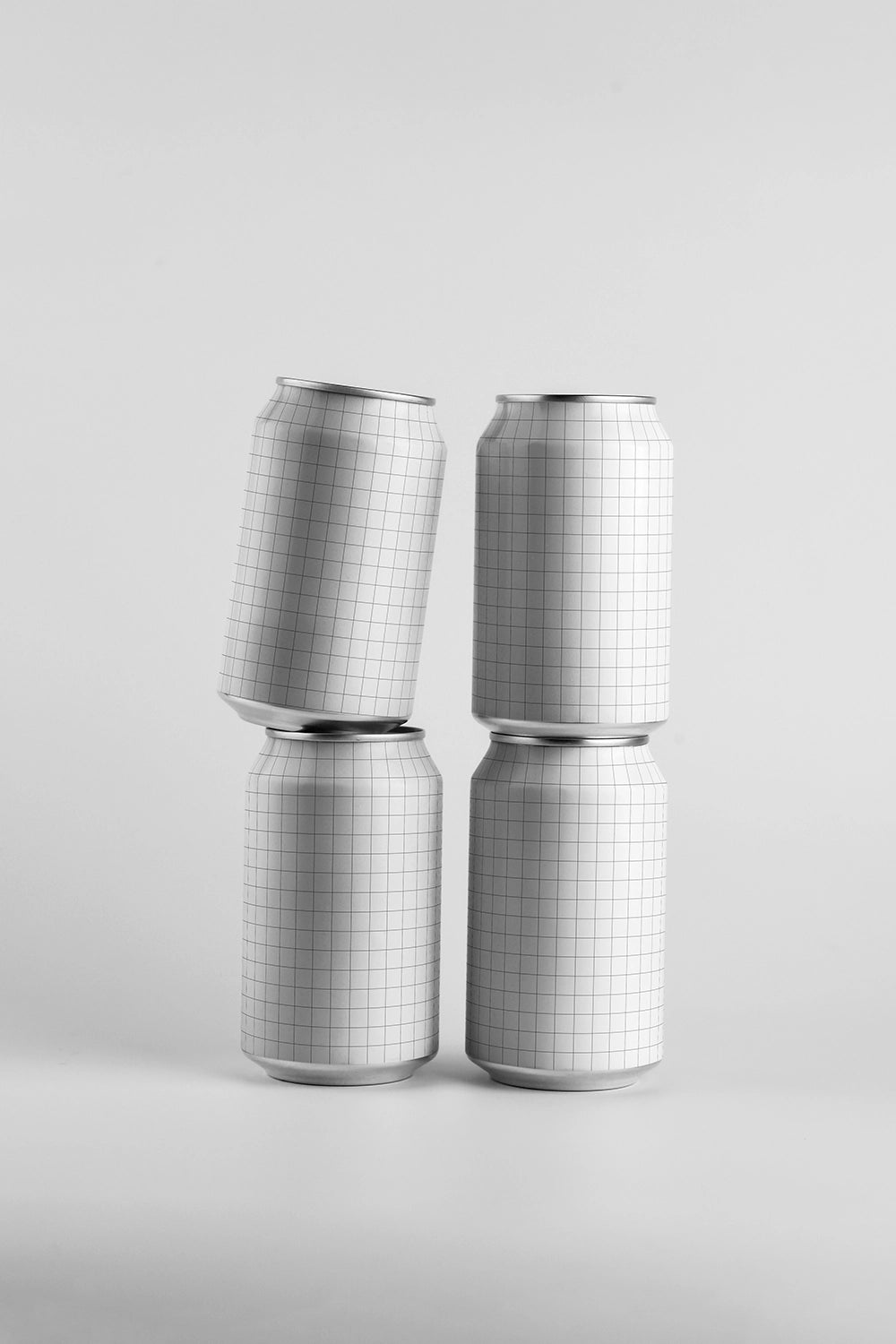 Aluminum can mockup collection four cans creative stack arrangement PSD packaging template modern style