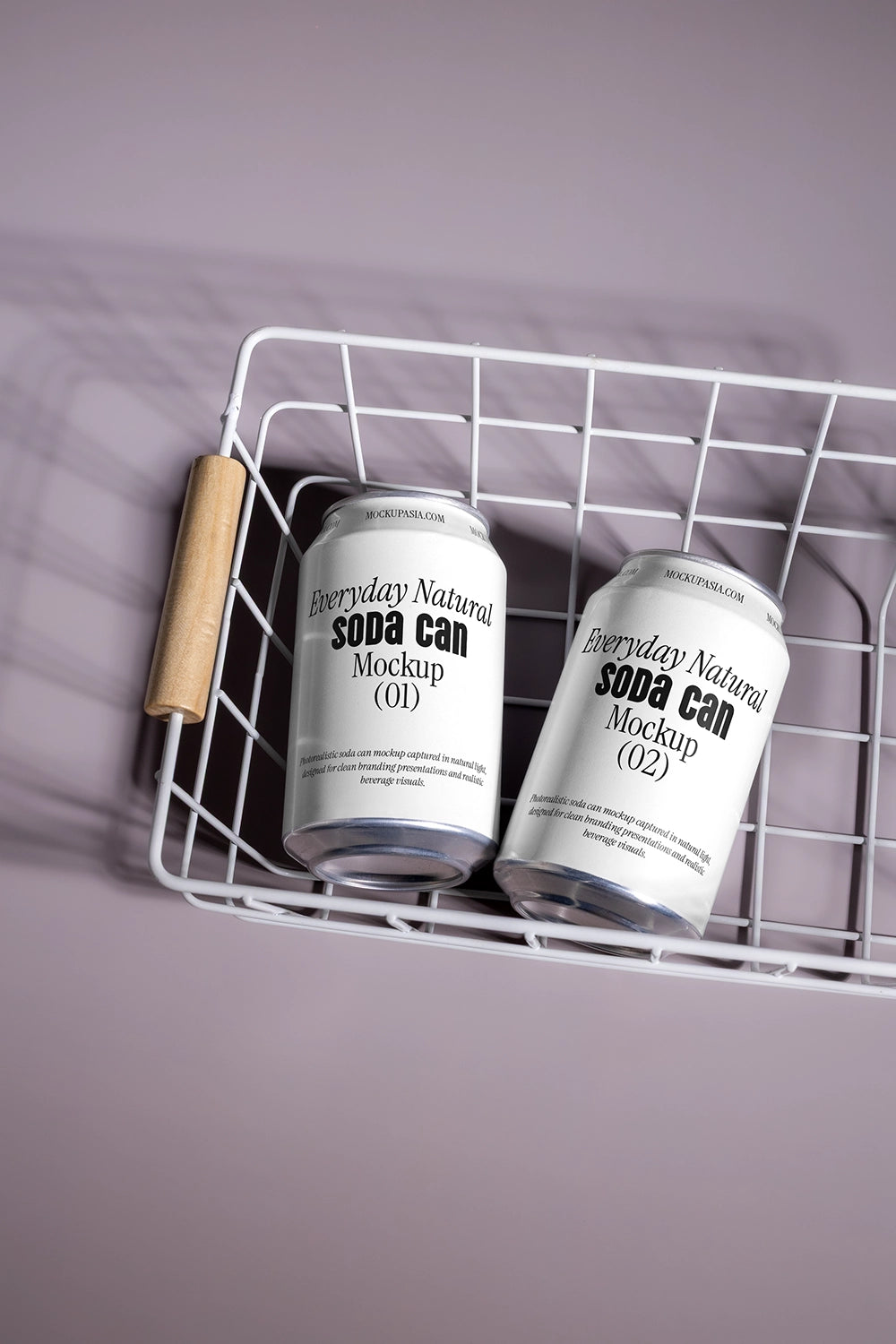 Two soda cans mockup in wire basket top angle aluminum beverage packaging lifestyle scene