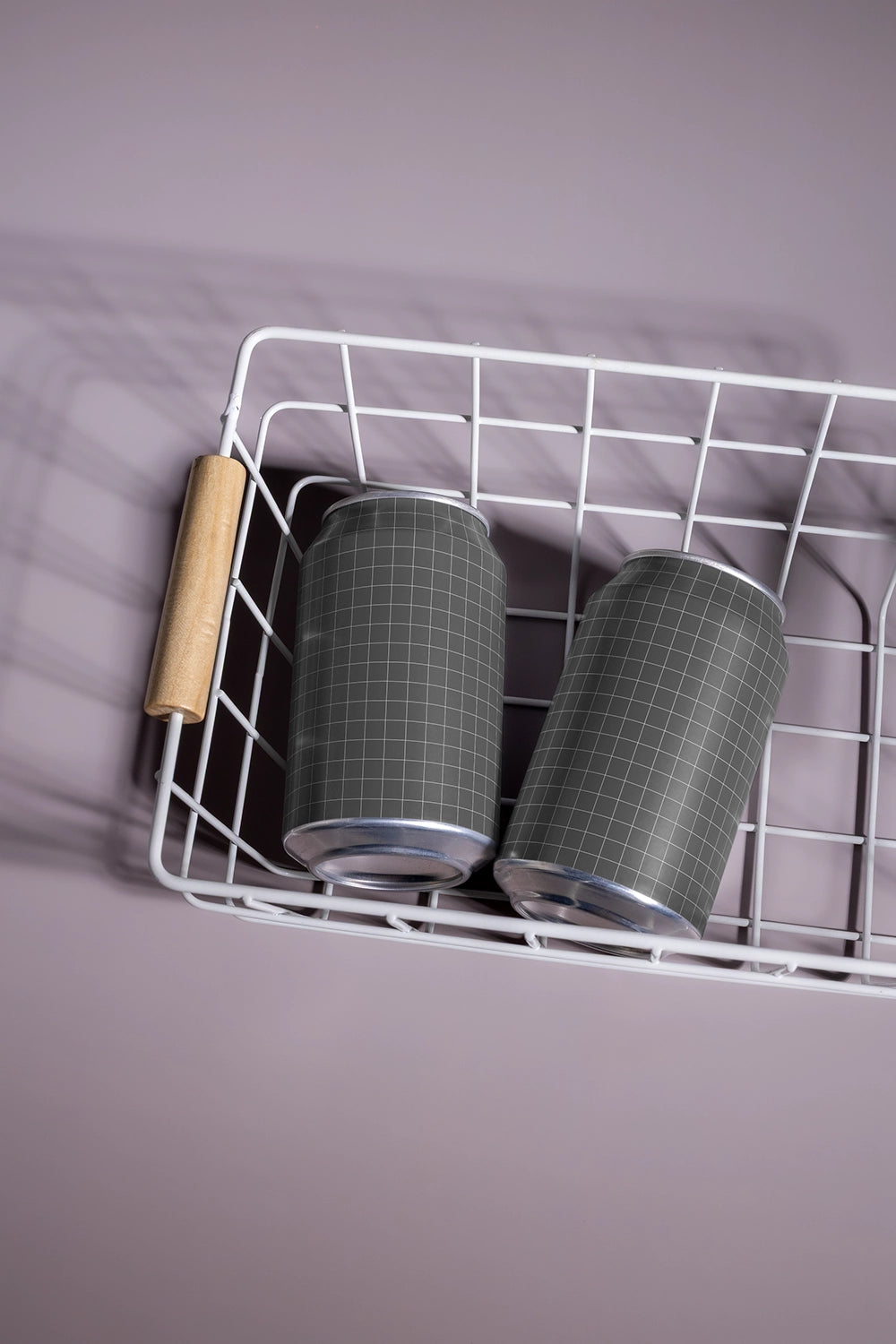 Aluminum soda can mockup two cans in basket overhead angle realistic lifestyle packaging PSD