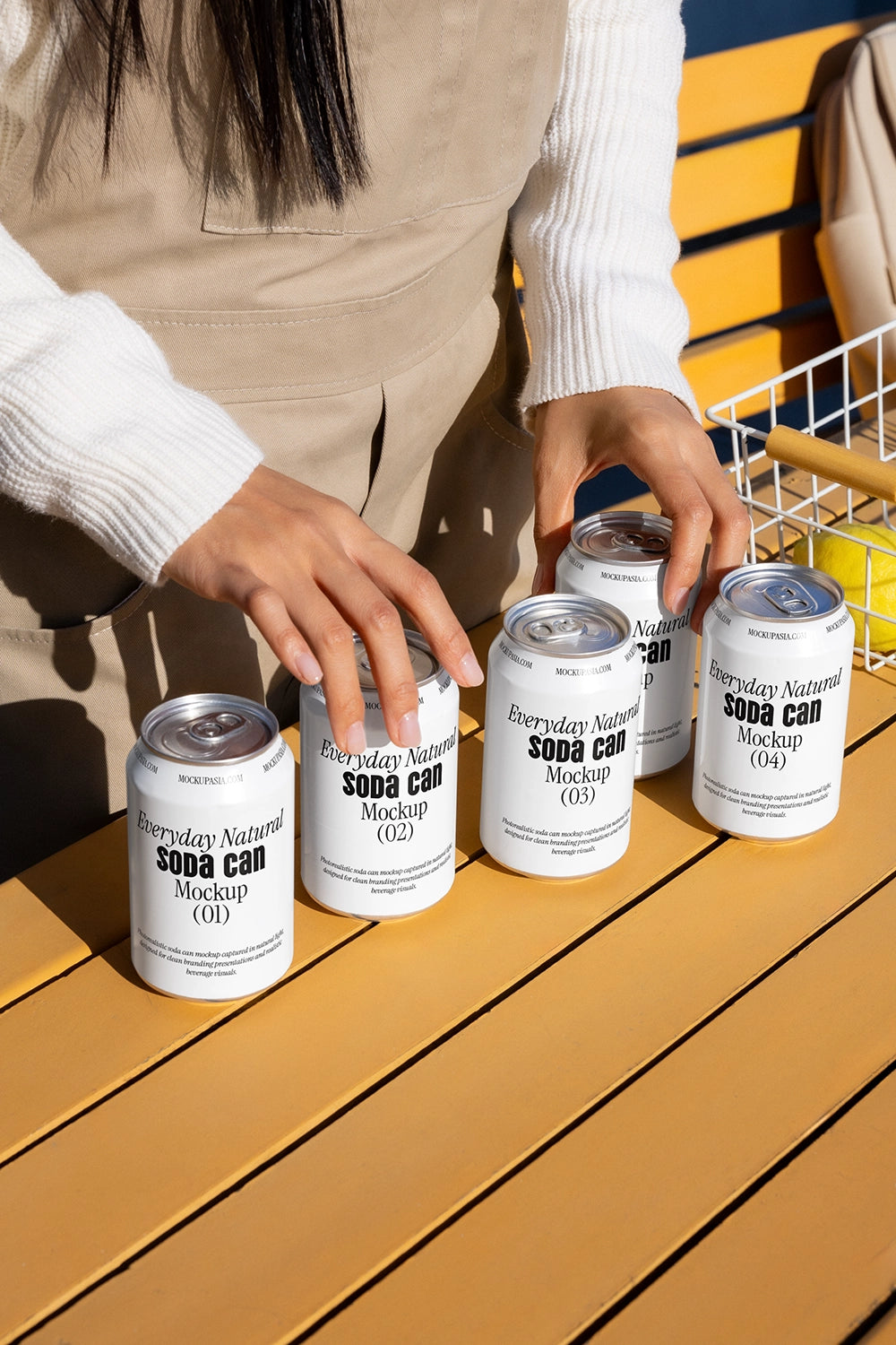 Set of drink cans mockup with hands interaction natural light branding presentation template