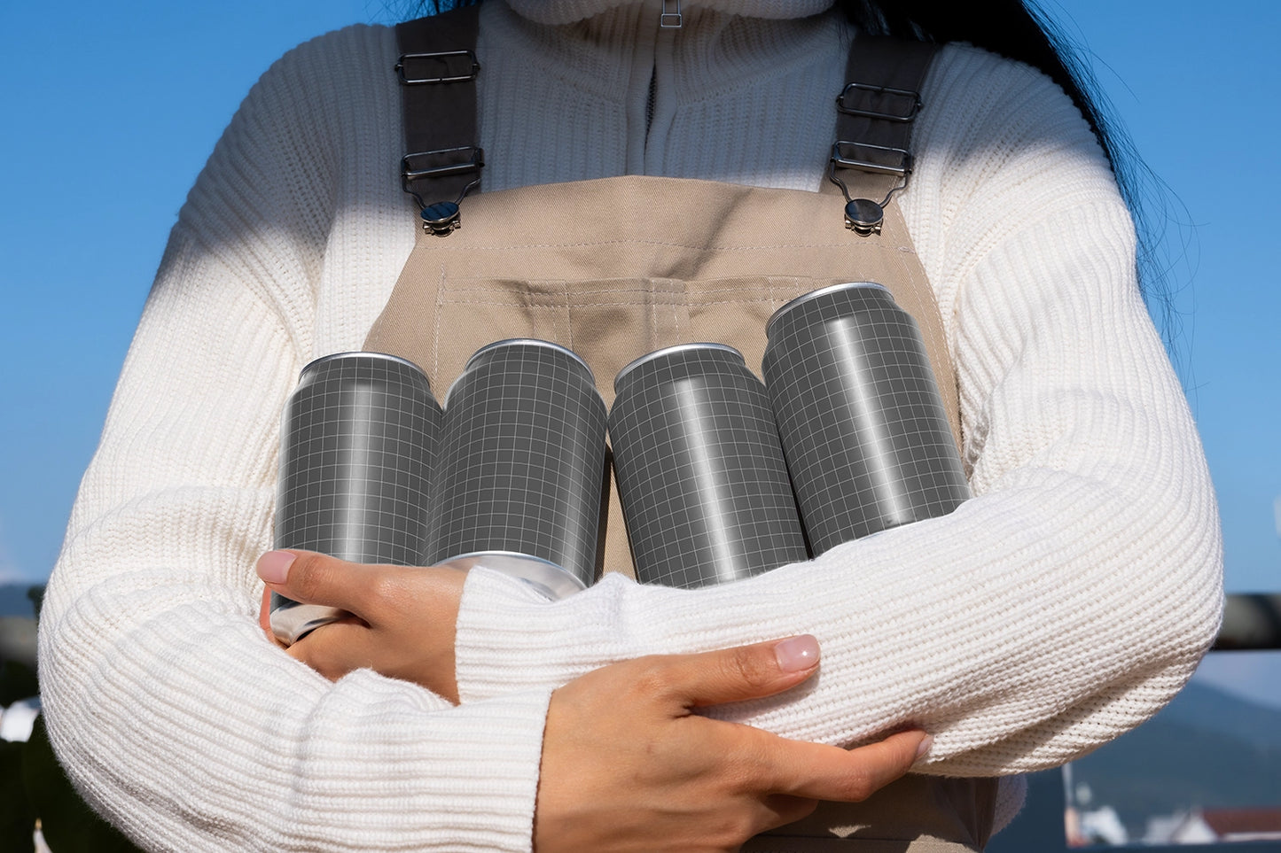 Person holding multiple soda cans mockup outdoor lifestyle aluminum beverage packaging scene