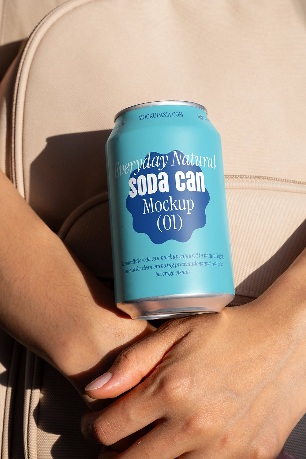Drink can mockup in hands natural light minimal composition branding presentation template