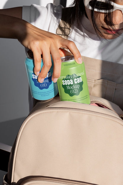 Drink cans mockup pair being placed in bag natural light branding presentation template