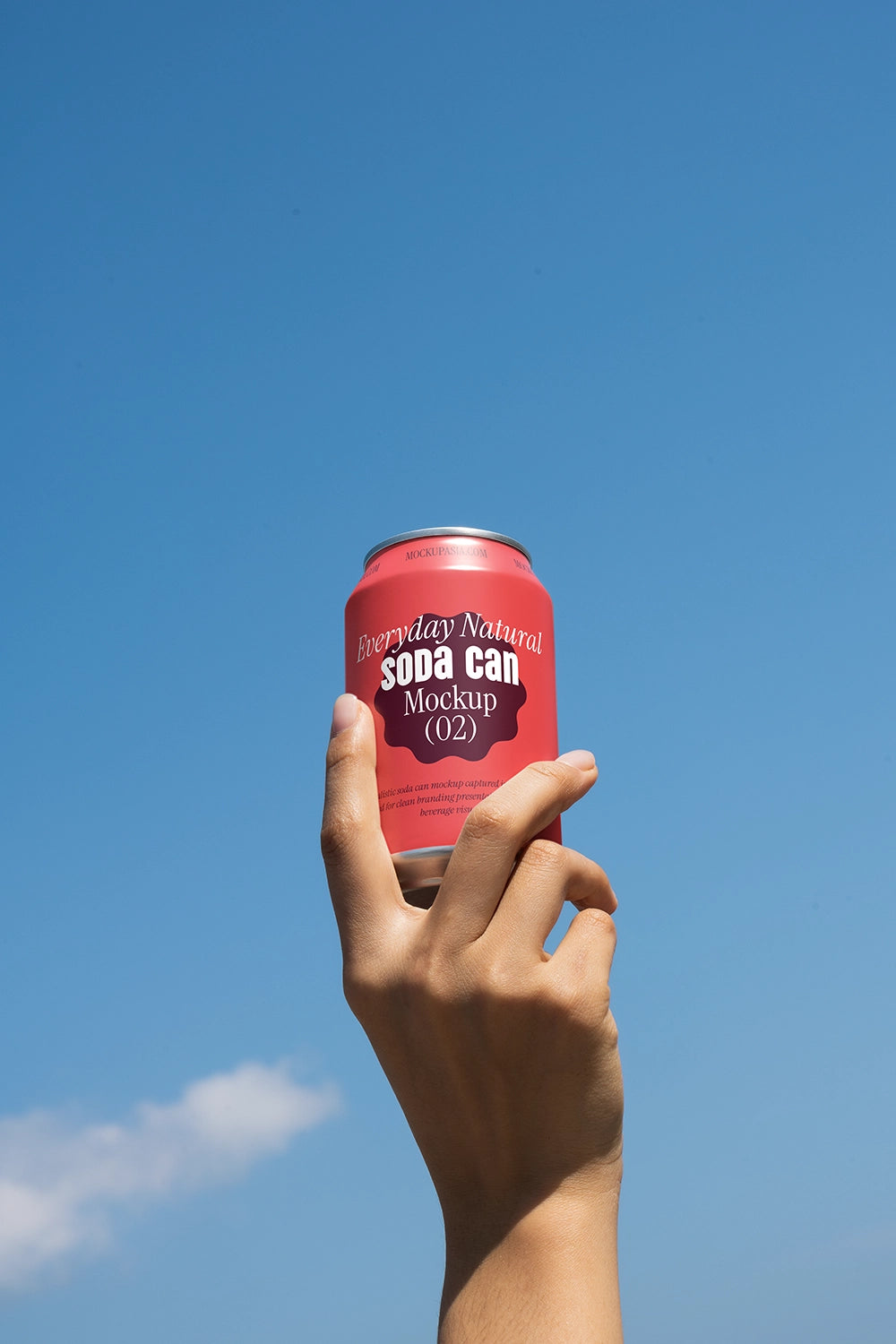 Drink can mockup in hand sky background clean natural light branding presentation template