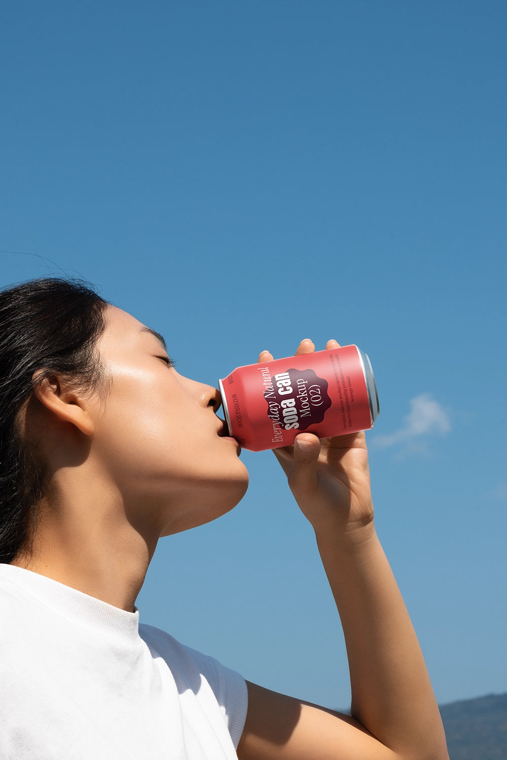 Drink can mockup in use natural light sky background lifestyle branding presentation template