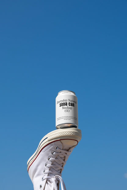 Drink can mockup on shoe minimal sky background dynamic branding presentation template