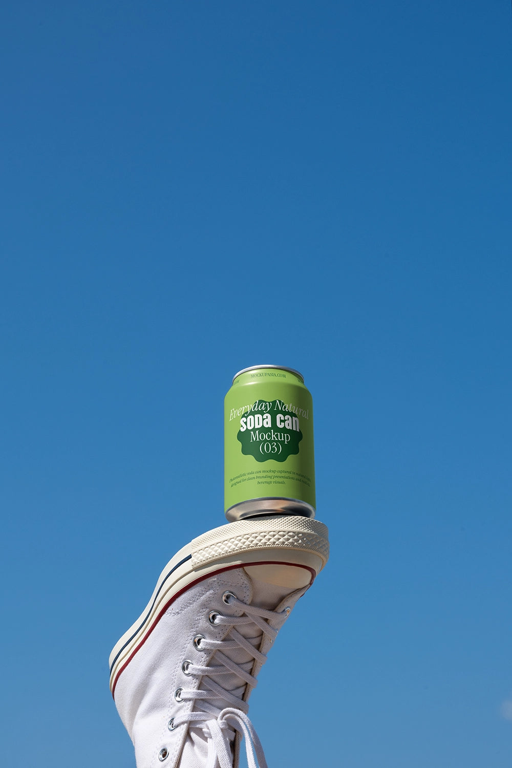 Aluminum soda can mockup on sneaker sole realistic outdoor creative packaging PSD