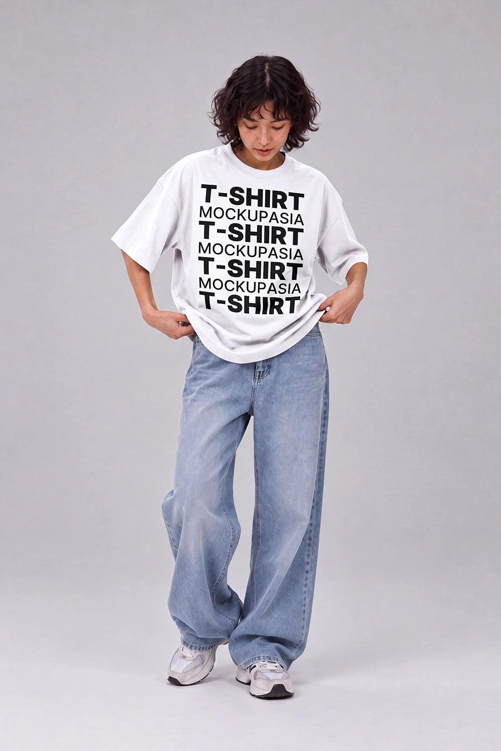 White T-shirt mockup featuring female model in standing pose