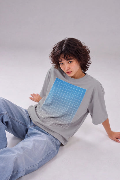 streetwear t-shirt PSD mockup with seated model and clean neutral background