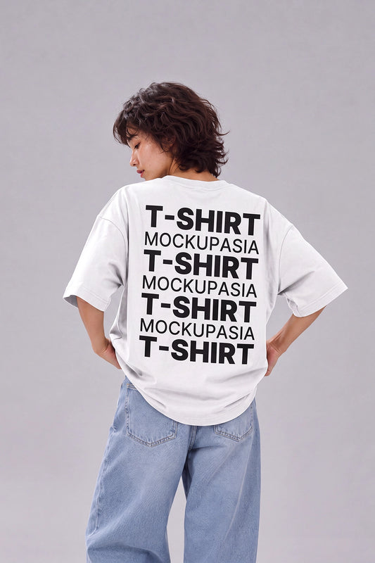 back t-shirt mockup on standing female model wearing oversized white tee