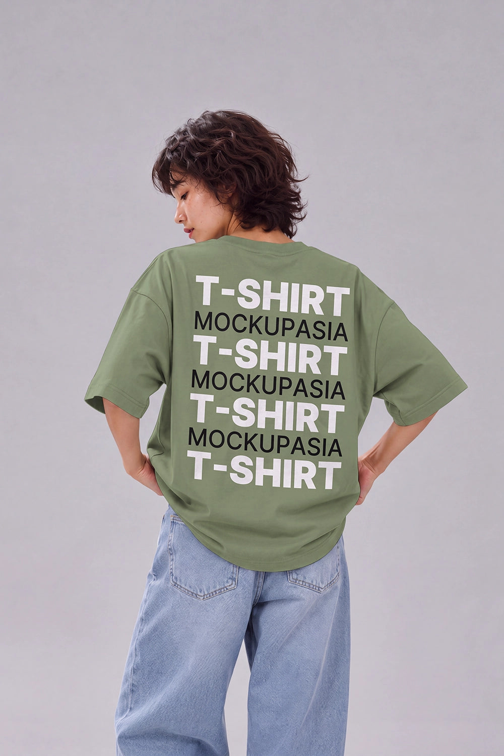 streetwear back print t-shirt mockup with standing model in jeans