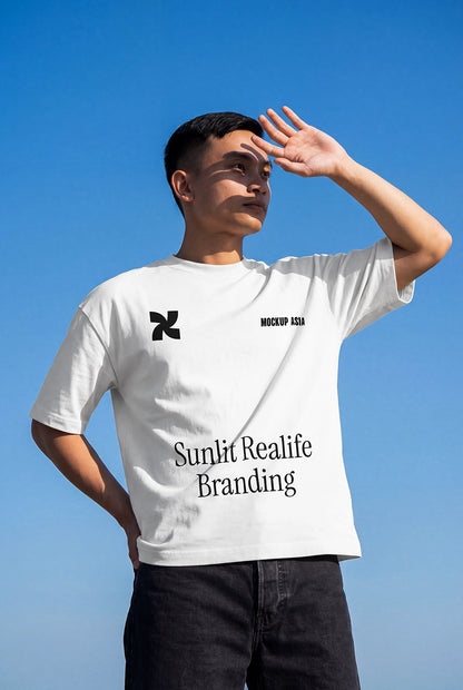 t shirt mockup on model with hand shading face under sunlight and blue sky background