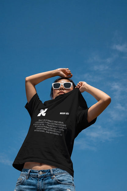 realistic t shirt mockup worn by person lifting shirt with outdoor sky background