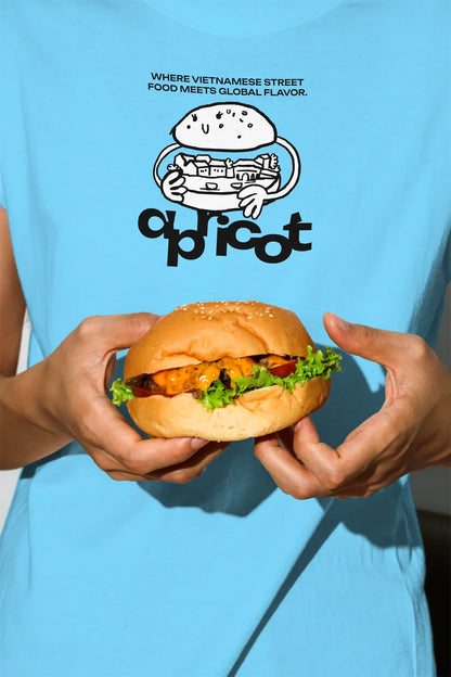 Realistic T-shirt mockup featuring Apricots Coffee Collection bundle by Mockup.Asia with apricot-themed design.