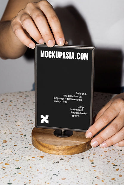 cafe menu holder mockup on terrazzo table with direct flash and realistic shadows