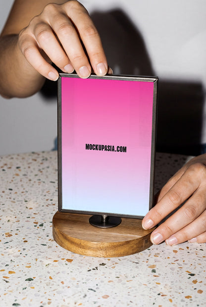 tabletop signage mockup with wooden base and bold lighting for cafe branding