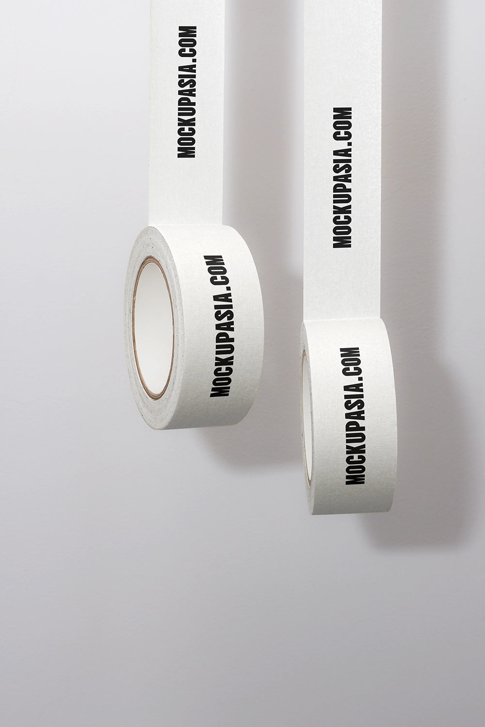 masking tape mockup rolls with hanging strips and minimal clean background