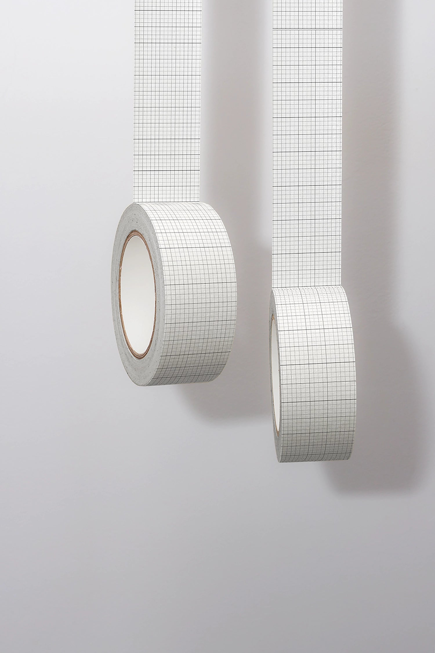 white tape mockup rolls with printed logo and clean neutral presentation