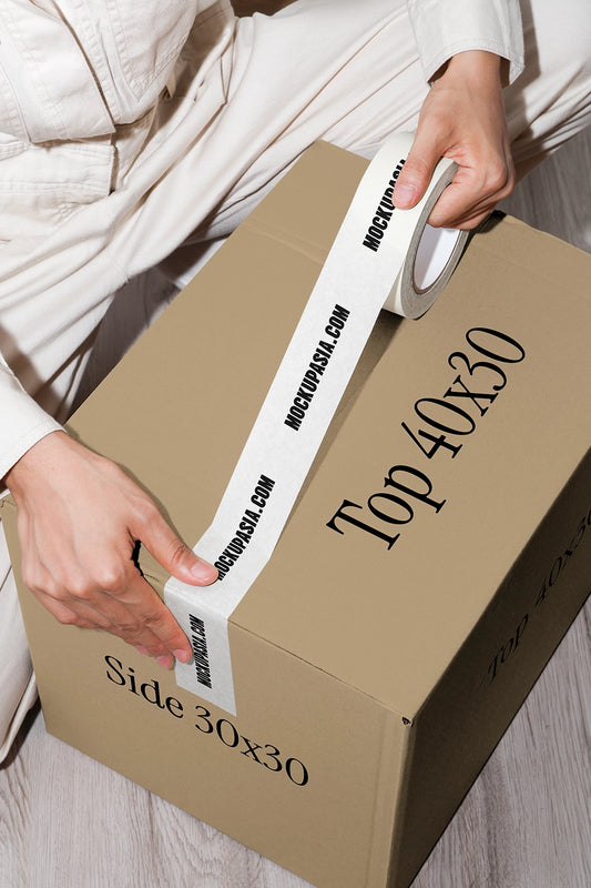 packaging box sealing mockup with branded tape and realistic hand interaction