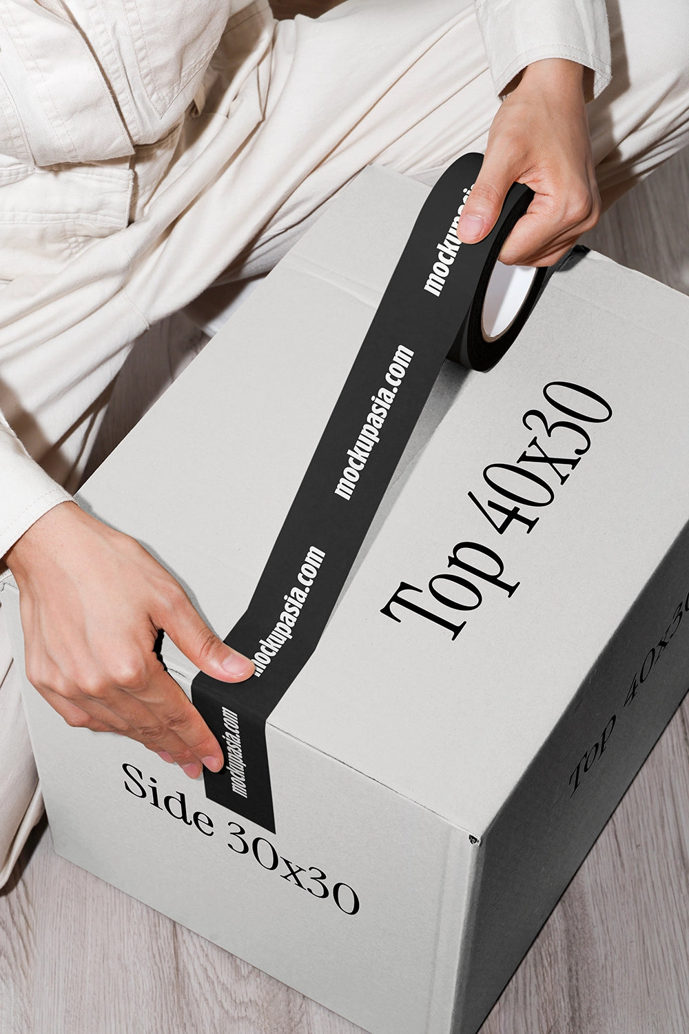 cardboard box mockup with adhesive tape applied and clean packaging scene