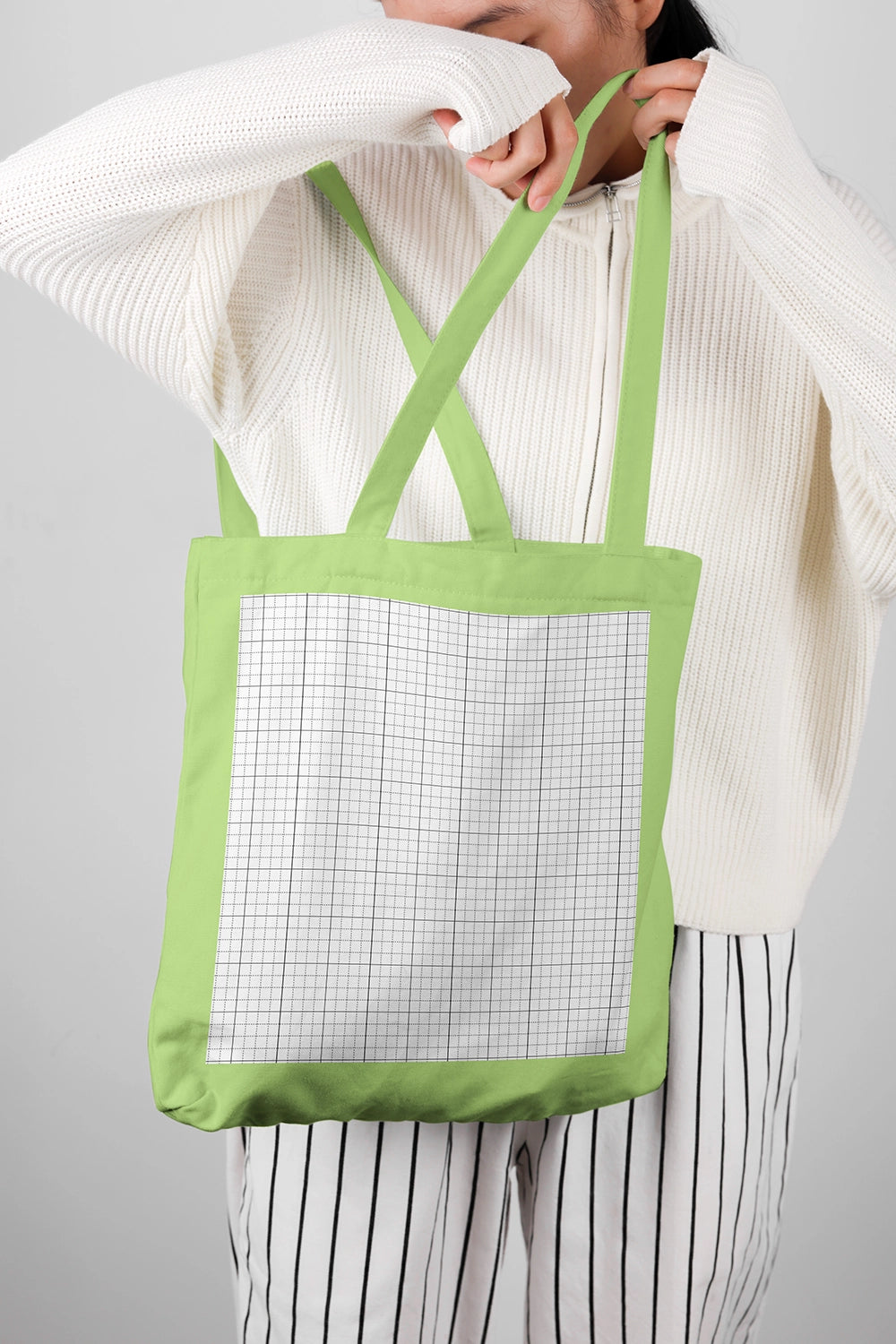 eco tote bag mockup with strap detail and soft neutral lighting setup