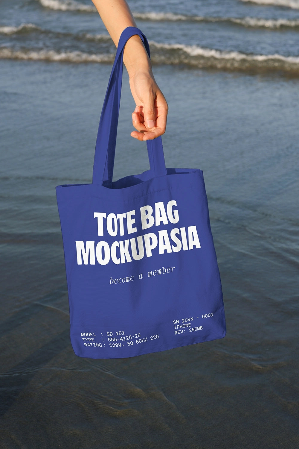 realistic canvas tote bag mockup with ocean backdrop and lifestyle presentation