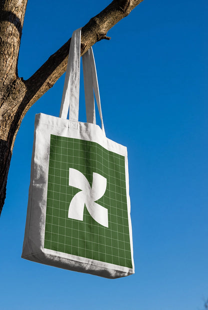 realistic tote bag mockup showing fabric folds and shadows in natural lighting