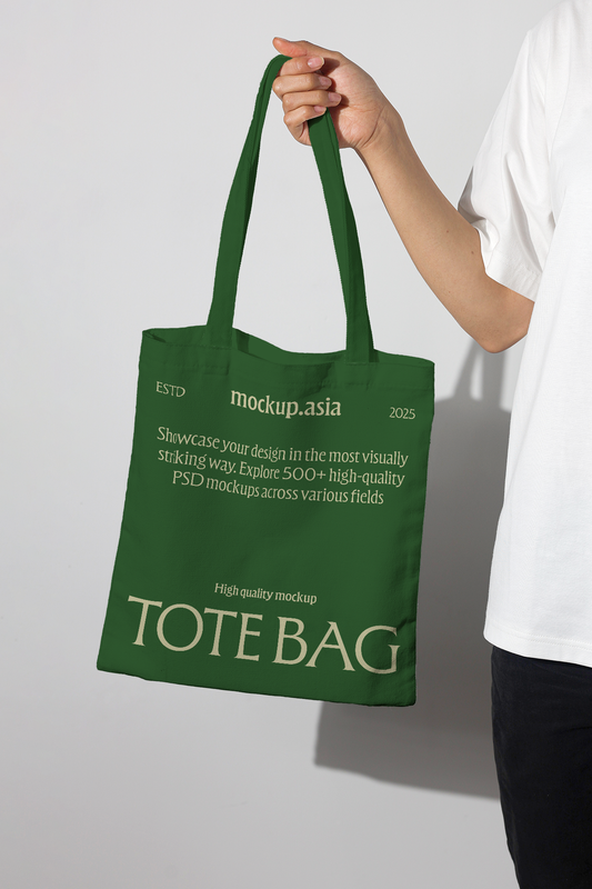 tote bag mockup with typography design, minimal white background and realistic lighting