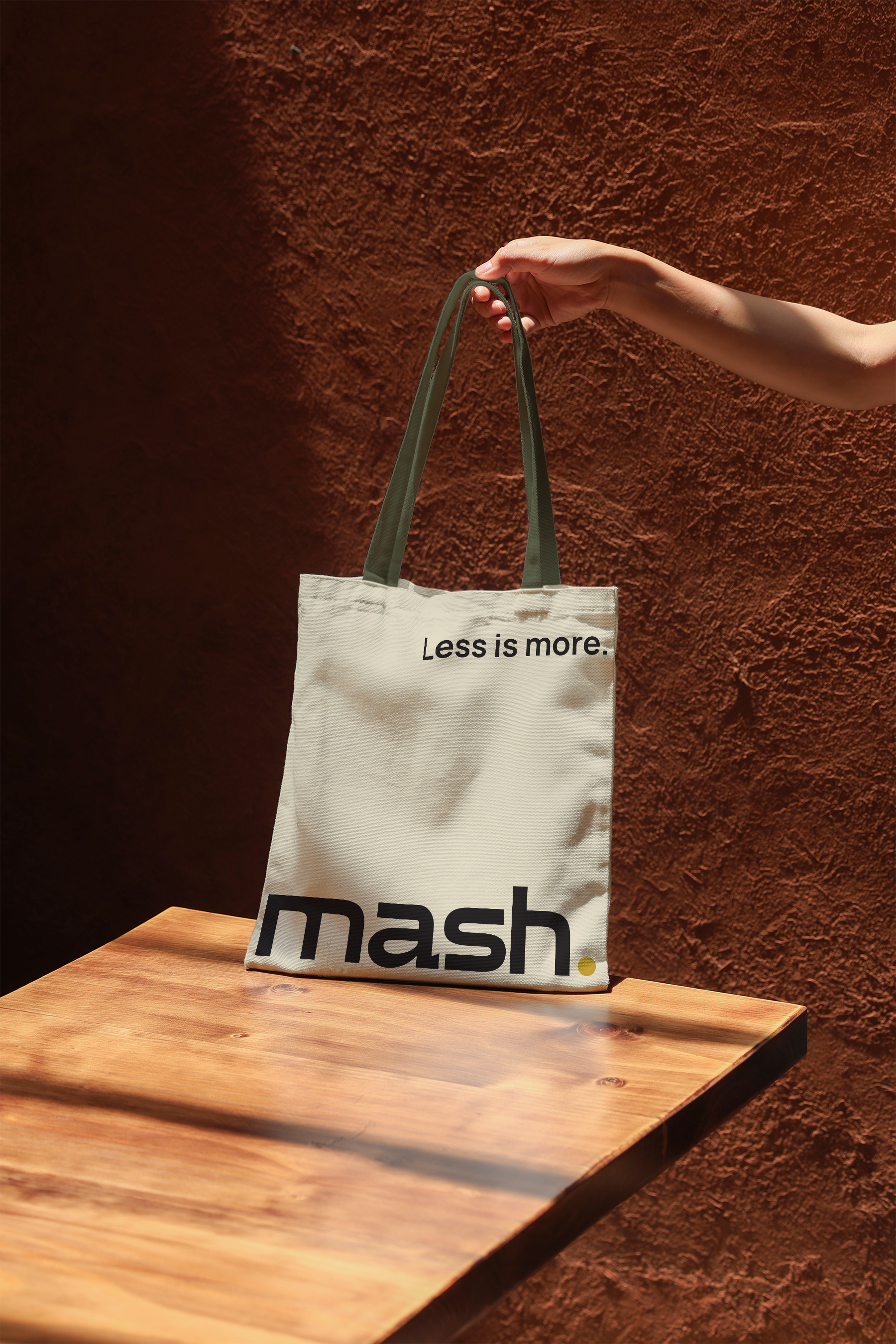 cotton tote bag mockup with hand interaction, realistic shadow and texture detail