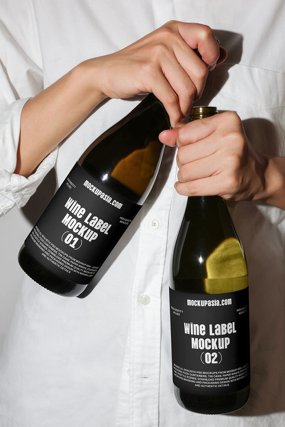 realistic wine label mockup with two bottles and human interaction scene