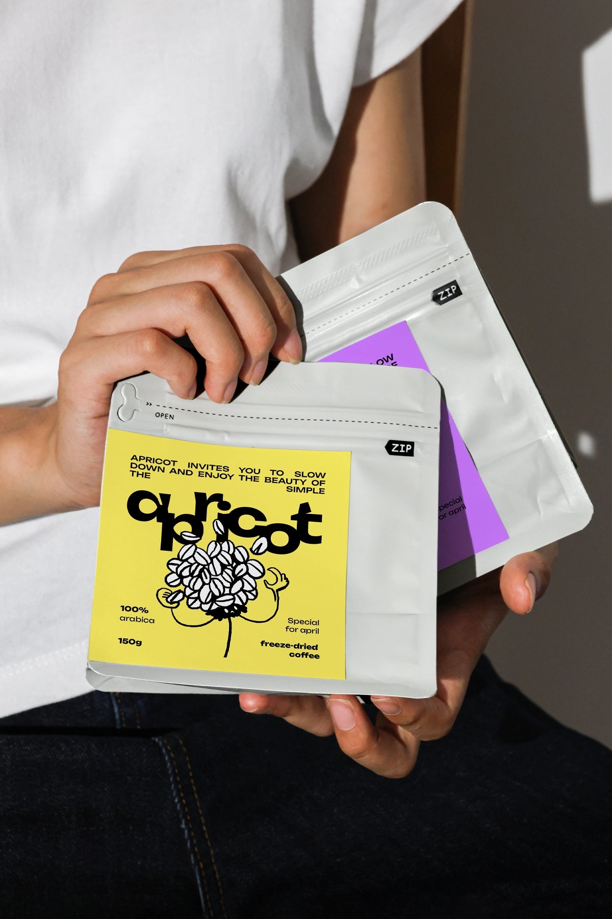 food packaging pouch mockup with zip lock held by person, realistic branding and product presentation