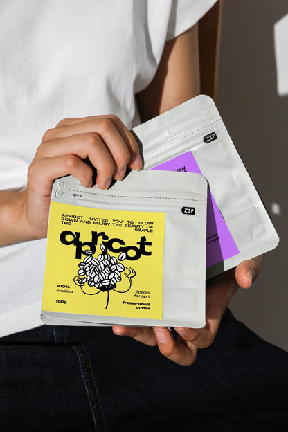 food packaging pouch mockup with zip lock held by person, realistic branding and product presentation