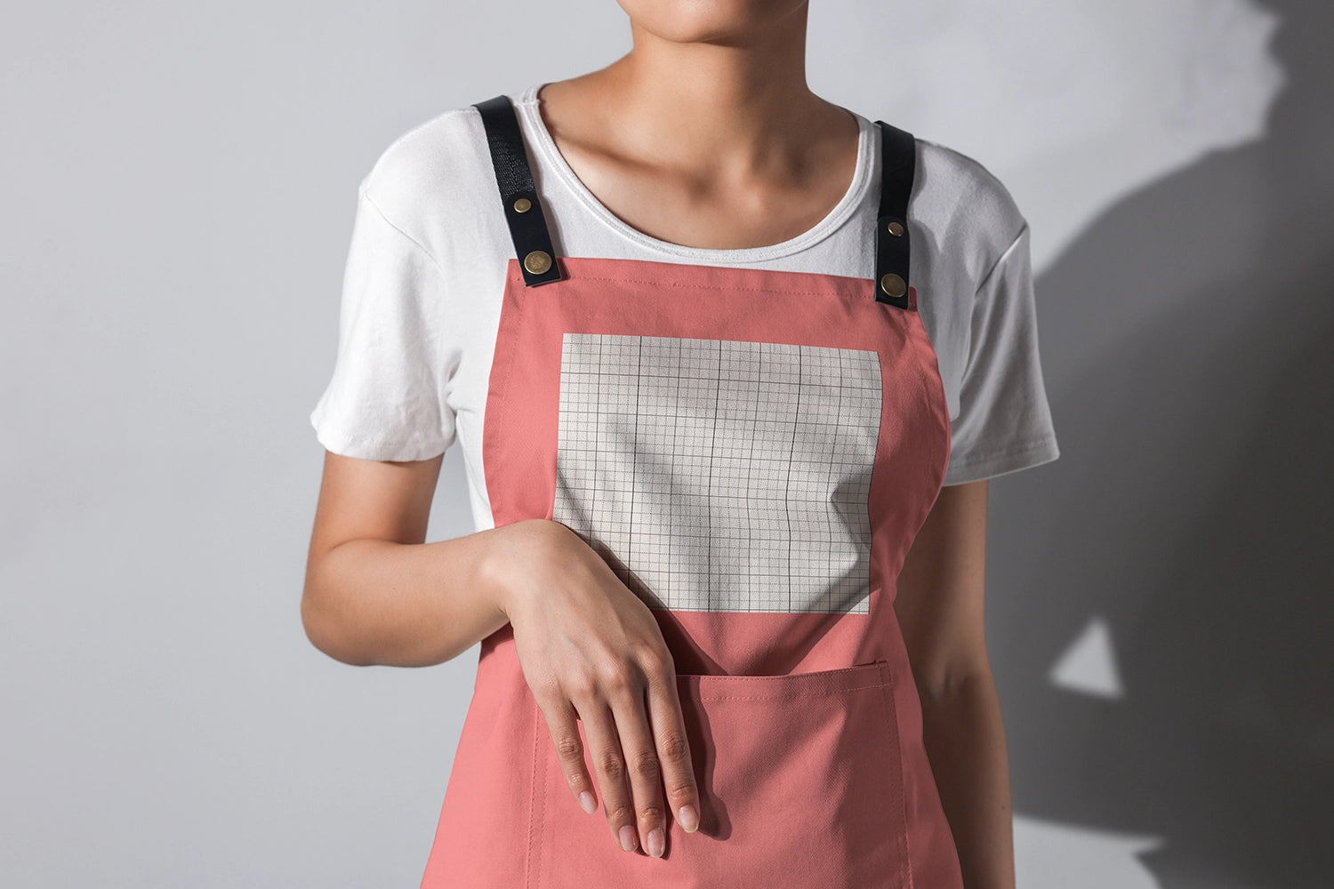 cooking apron mockup with model hand gesture clean studio light branding presentation