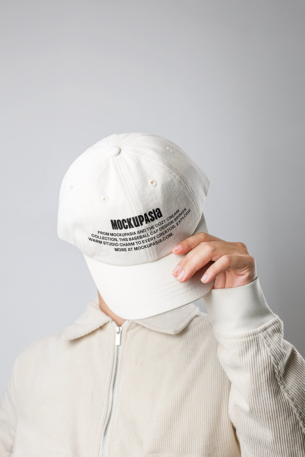 baseball cap mockup front view held by hand with minimal branding and clean background