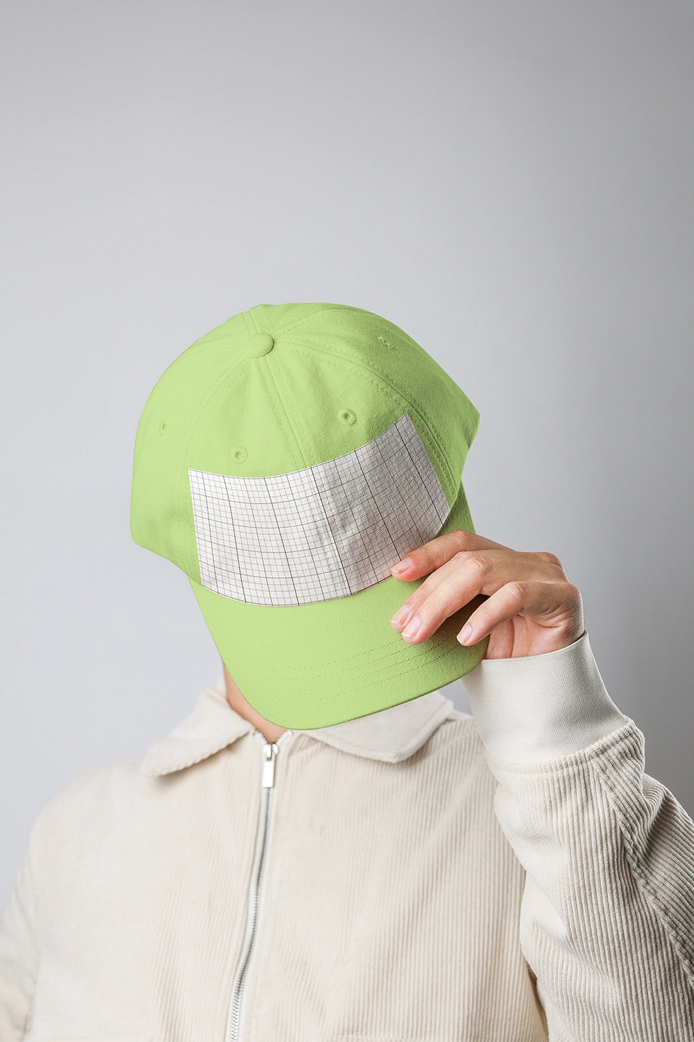 white hat mockup with hand interaction and modern minimal aesthetic presentation