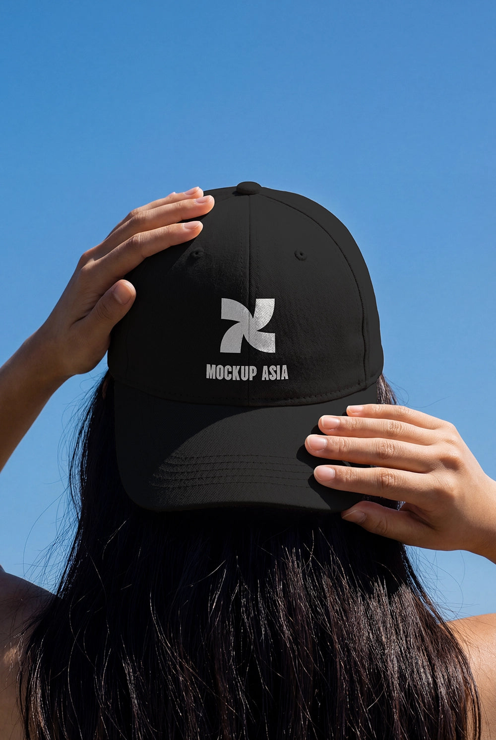 realistic cap mockup worn by person from behind with clean blue sky backdrop
