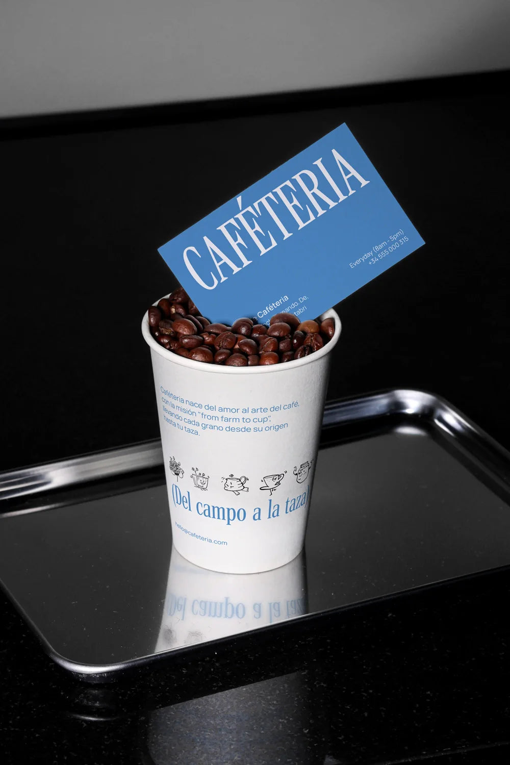 paper cup mockup with business card on top, realistic coffee shop branding scene