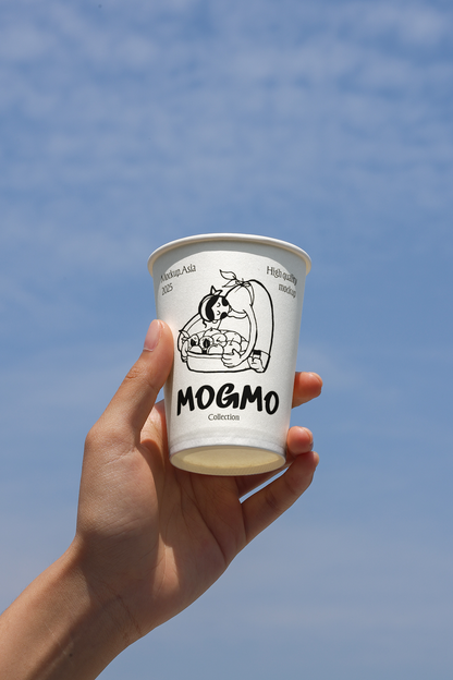 coffee cup mockup held in hand against blue sky with natural sunlight and realistic shadow