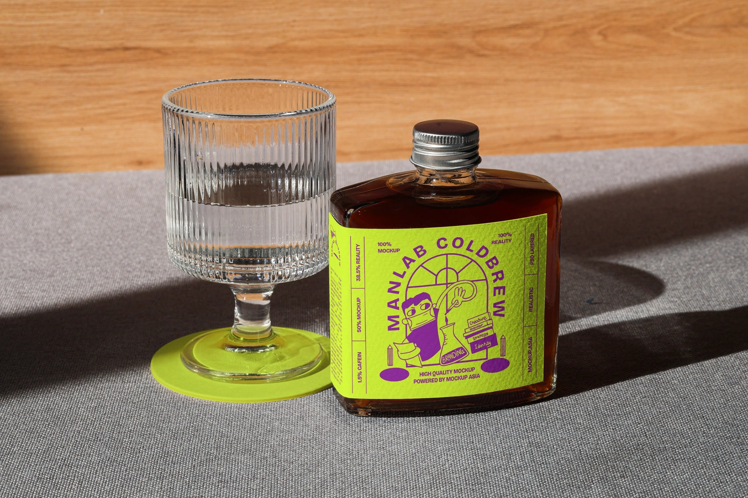 Coffee bottle mockup next to empty glass in minimal lifestyle scene
