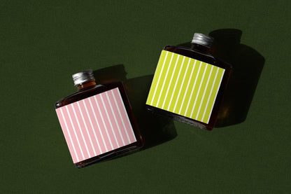 Coffee bottle mockup in top view layout with label variations and shadow
