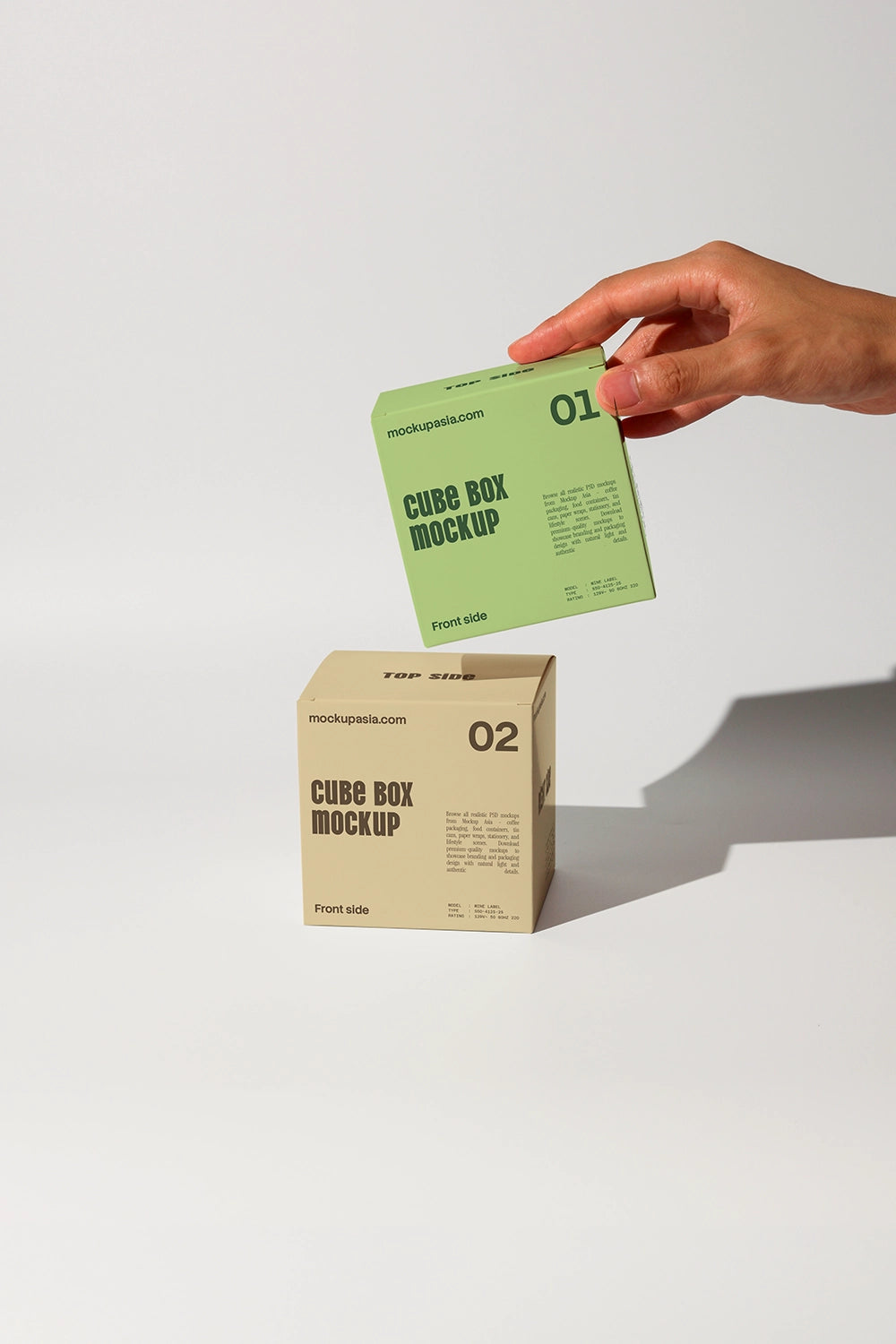 Minimal cube packaging mockup with two boxes and handheld presentation high contrast lighting