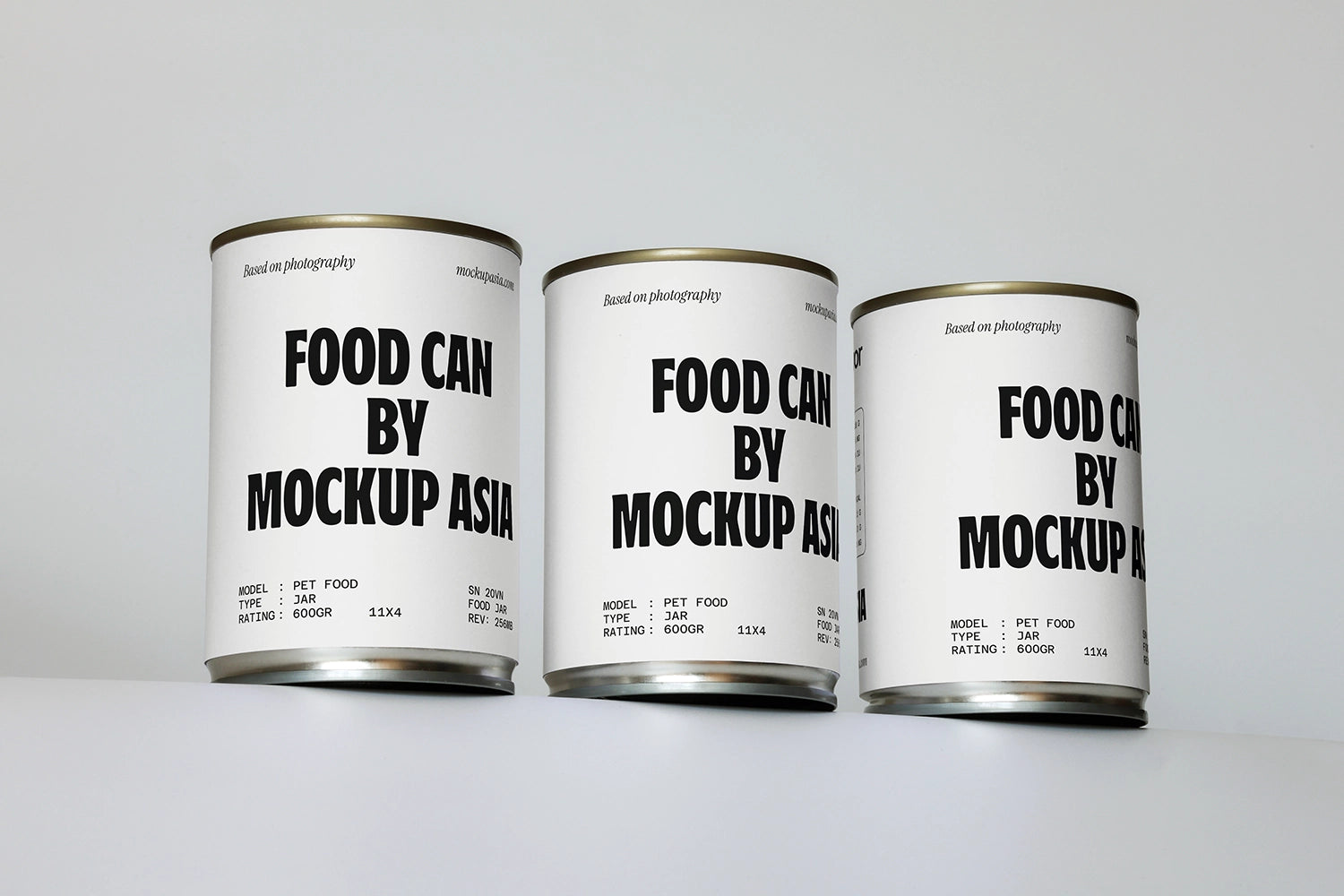 food can mockup set with three cans in clean studio environment and minimal design