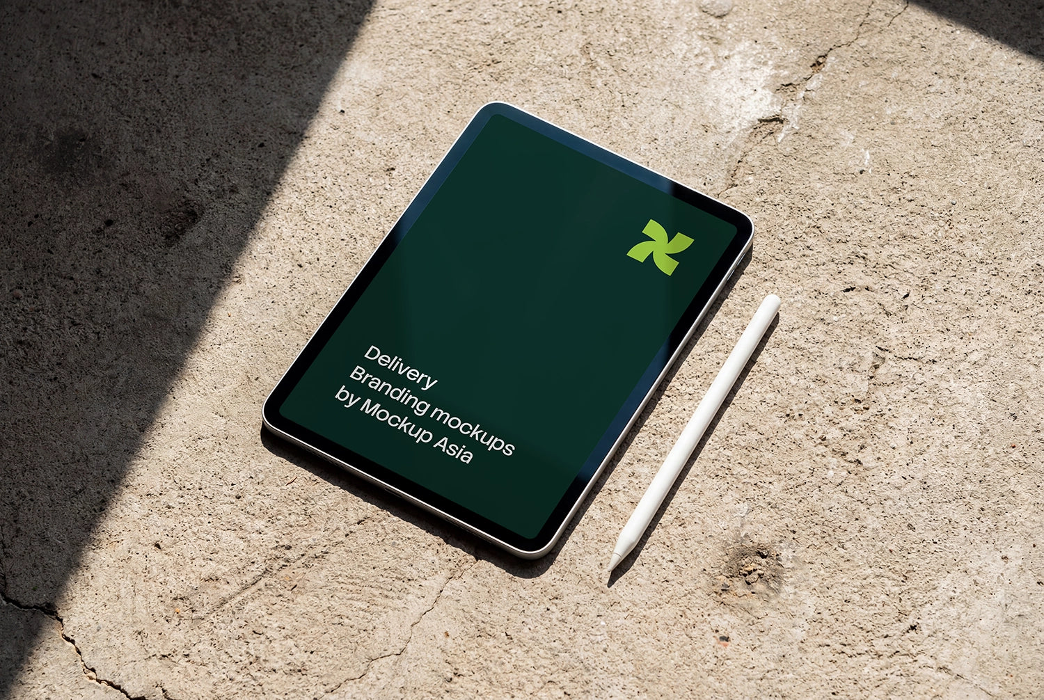 iPad Pro 11-inch mockup on concrete surface with Apple Pencil