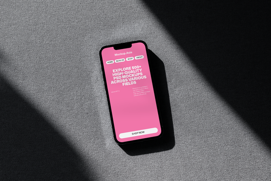 iPhone screen mockup in flat lay view with strong shadow lighting and fabric texture
