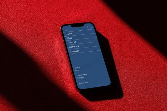 iPhone screen mockup displaying mobile UI menu with dramatic shadow lighting

